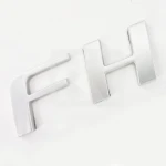 Hood badge logo "FH" Volvo FH4 21409441